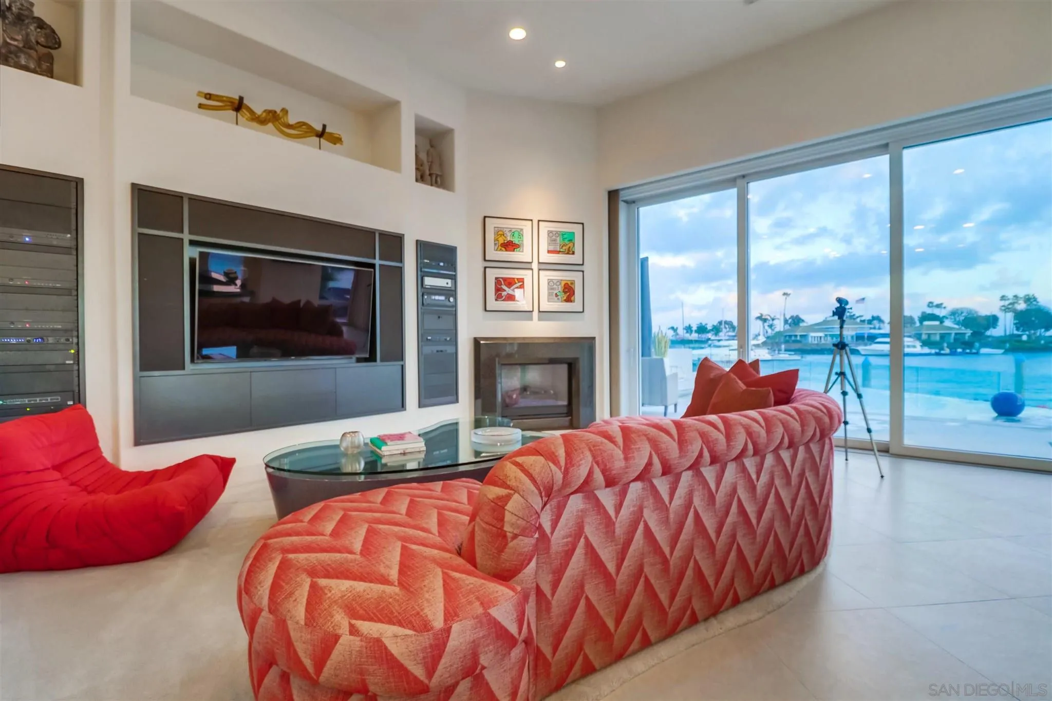 2 Green Turtle Road Coronado, CA 92118 - Photo 11 of 54 a bedroom with a bed and a large window