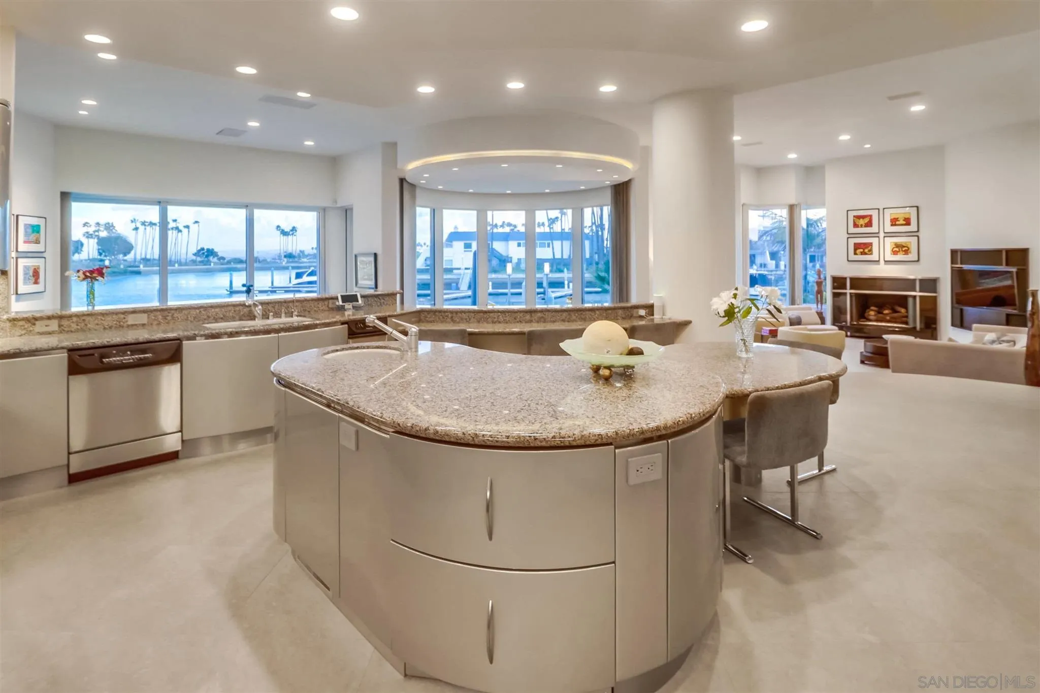 2 Green Turtle Road Coronado, CA 92118 - Photo 14 of 54 a dining hall with stainless steel appliances granite countertop a sink and a large window