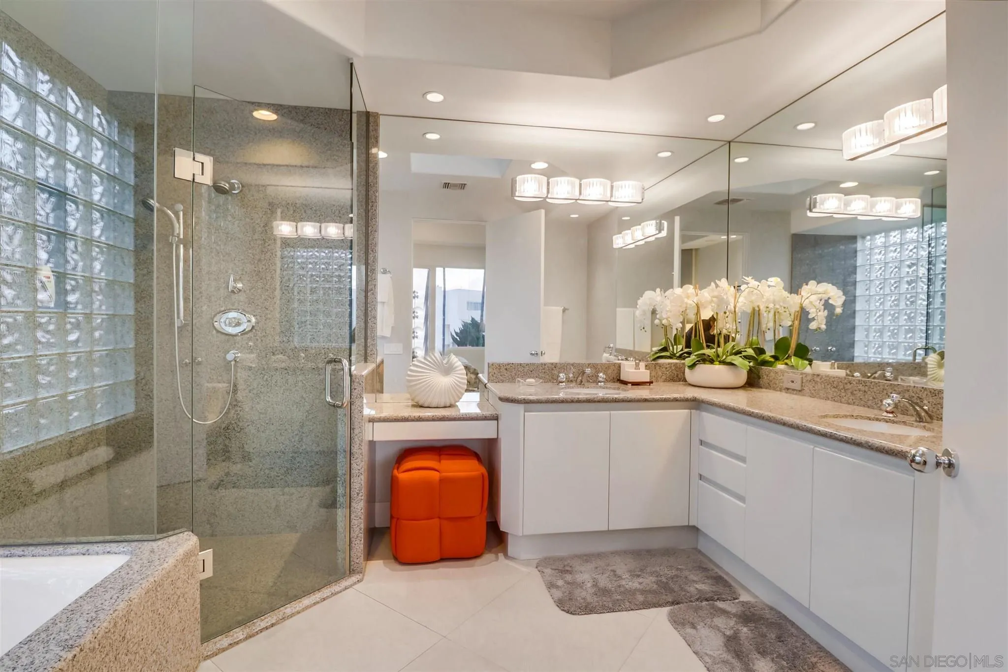 2 Green Turtle Road Coronado, CA 92118 - Photo 30 of 54 a bathroom with a granite countertop sink mirror and shower
