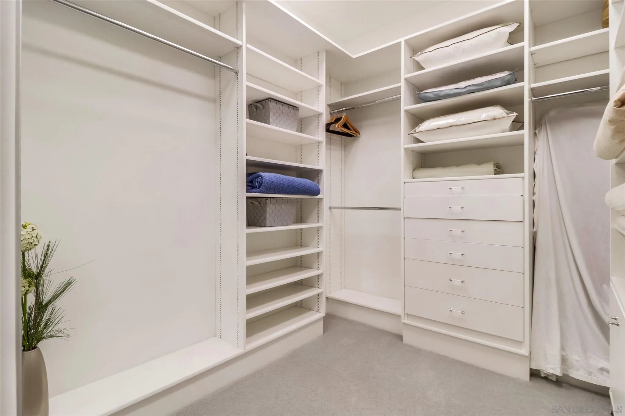 2 Green Turtle Road Coronado, CA 92118 - Photo 34 of 54 a view of walk in closet with empty racks