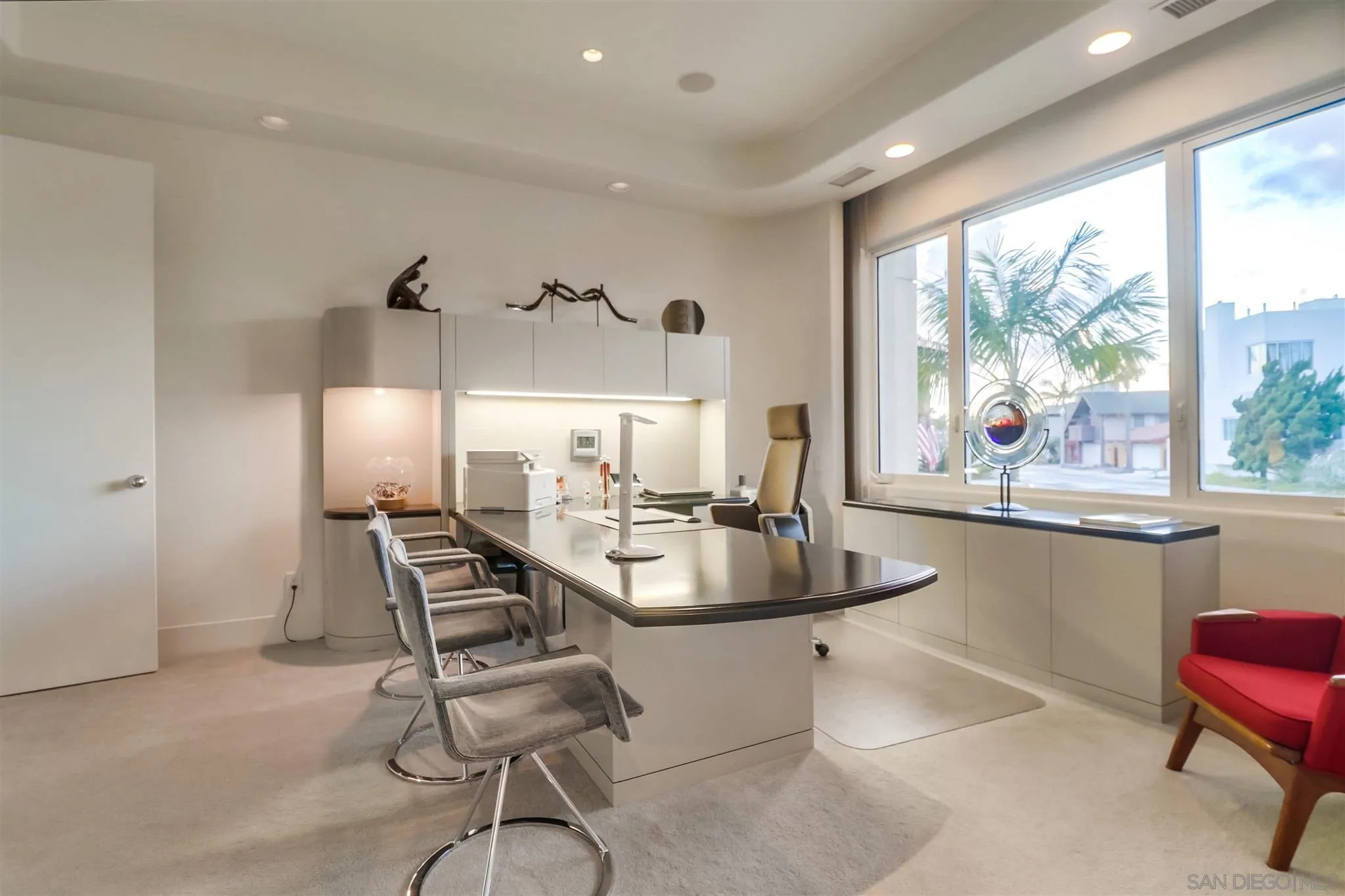 2 Green Turtle Road Coronado, CA 92118 - Photo 36 of 54 a dining room with furniture and a large window