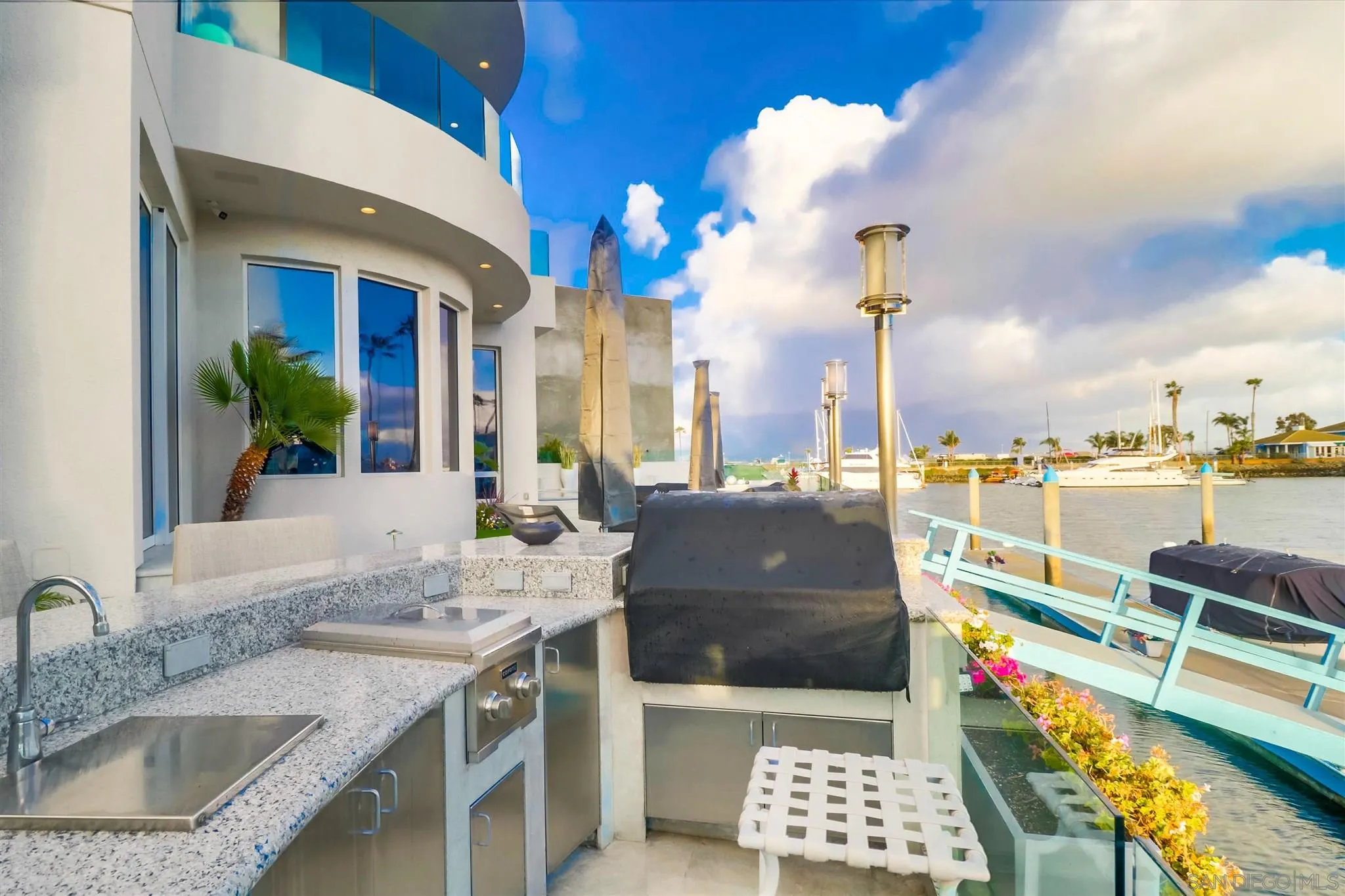 2 Green Turtle Road Coronado, CA 92118 - Photo 44 of 54 a view of a kitchen with granite countertop a sink and a stove