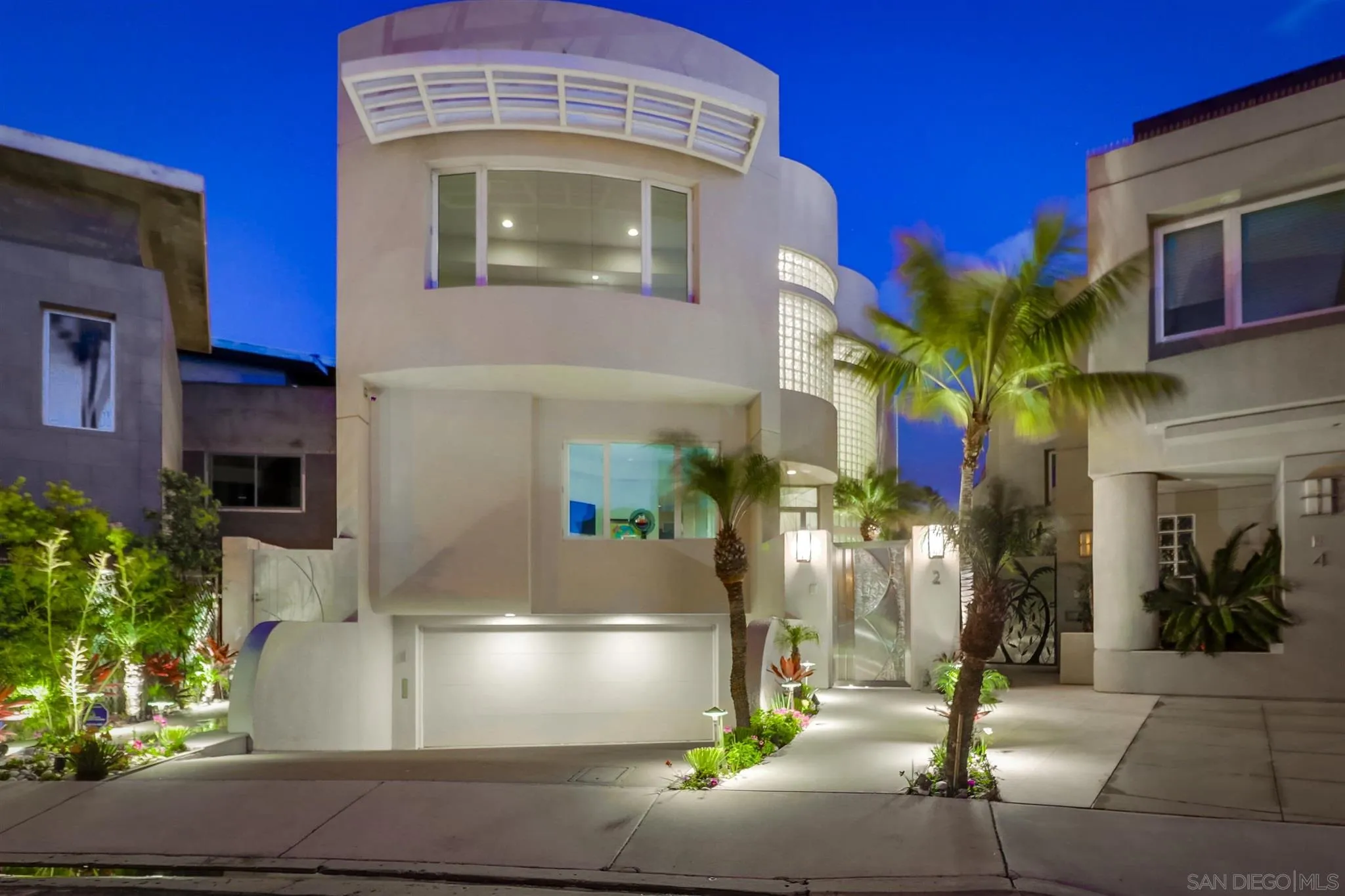 2 Green Turtle Road Coronado, CA 92118 - Photo 50 of 54 a front view of a house with a garage