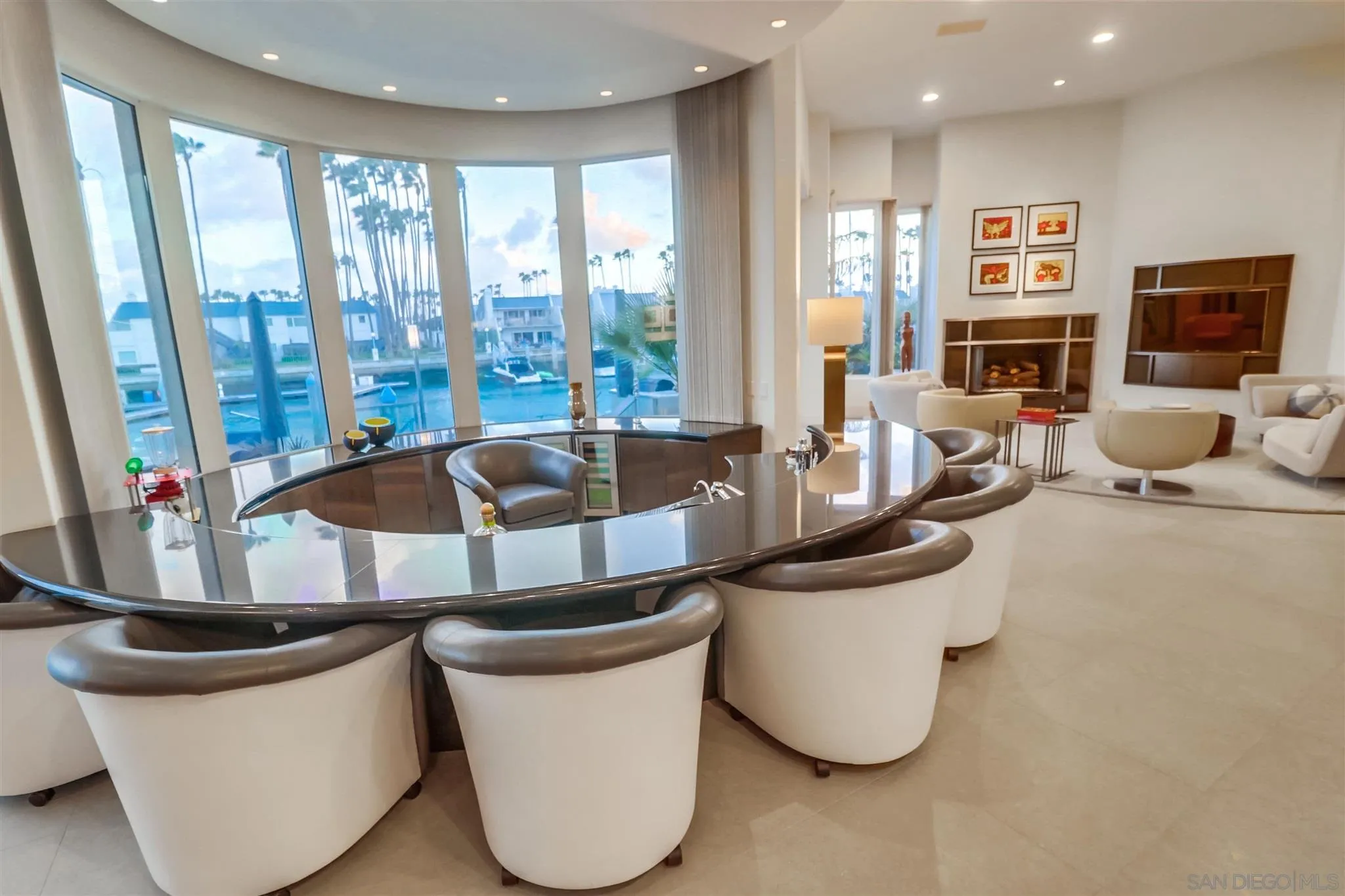 2 Green Turtle Road Coronado, CA 92118 - Photo 8 of 54 a living room with fireplace furniture and a large window