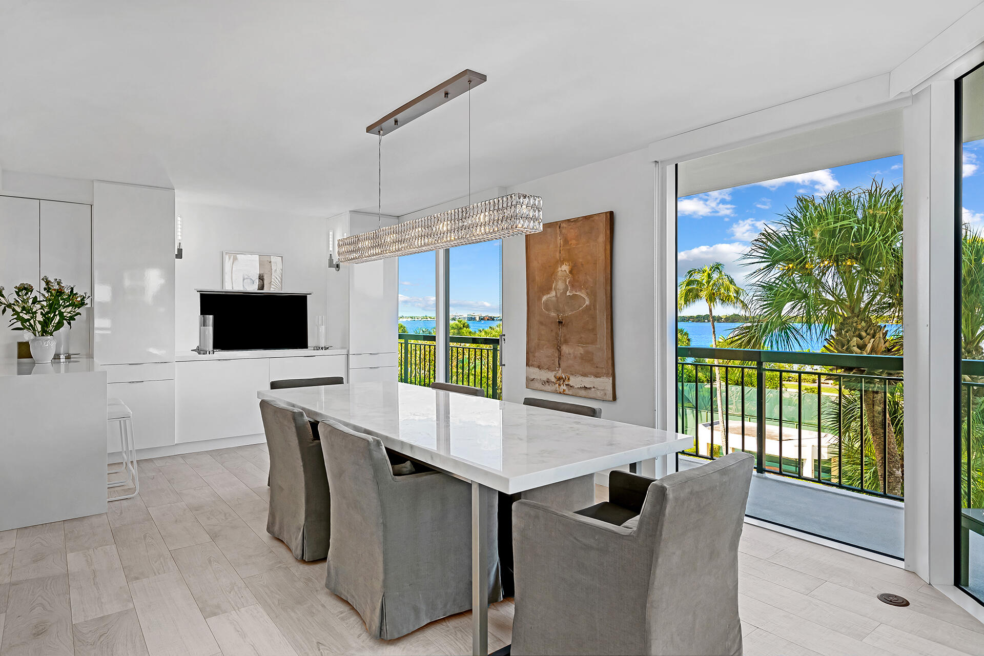 3140 South Ocean Boulevard, Unit 307S Palm Beach, FL 33480 - Photo 13 of 58 a living room with furniture tv and a large window