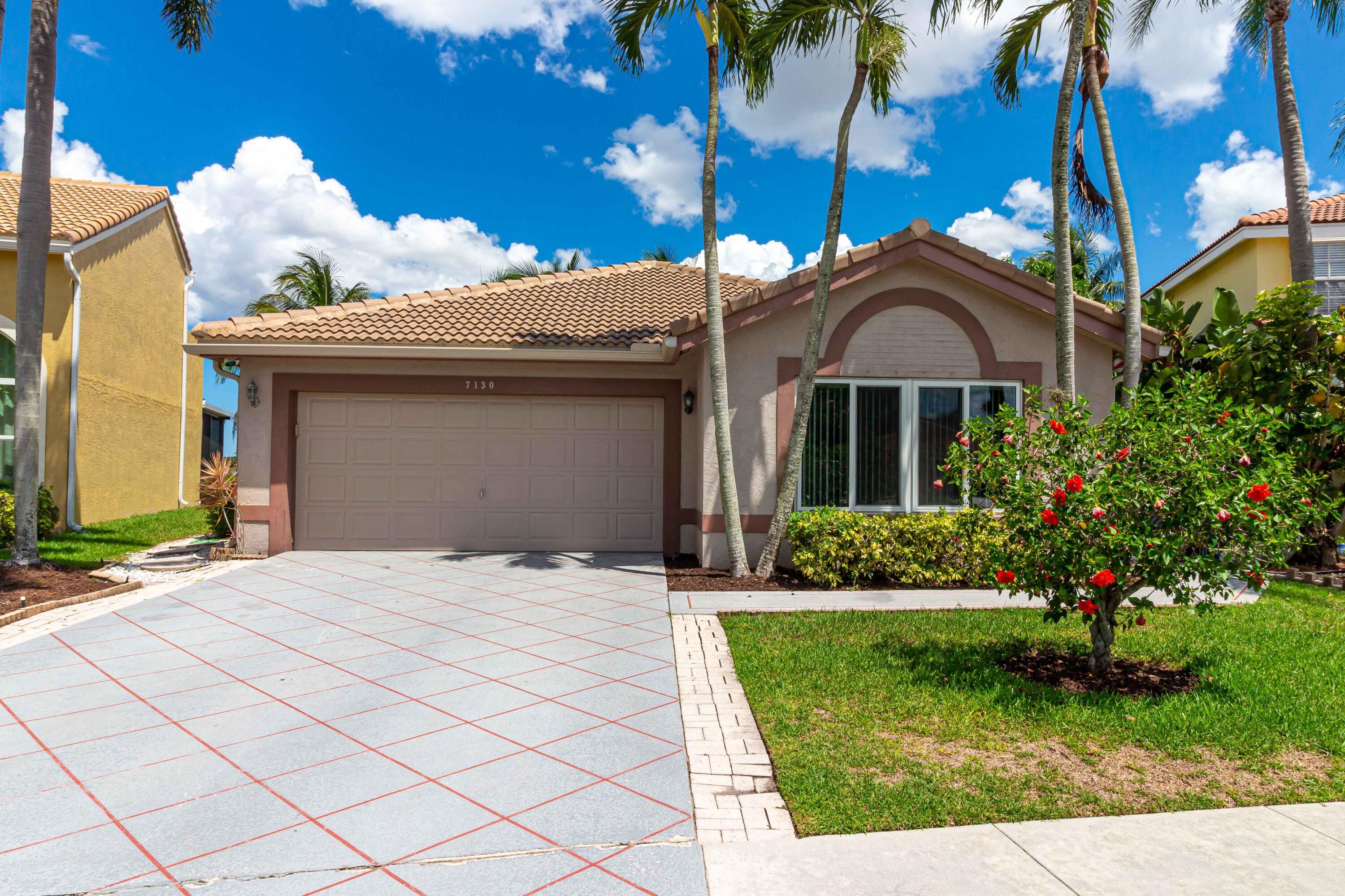 7130 Michigan Isle Road Lake Worth, FL 33467 - Photo 1 of 24 7130 Michigan Isle Rd (1 of 25)