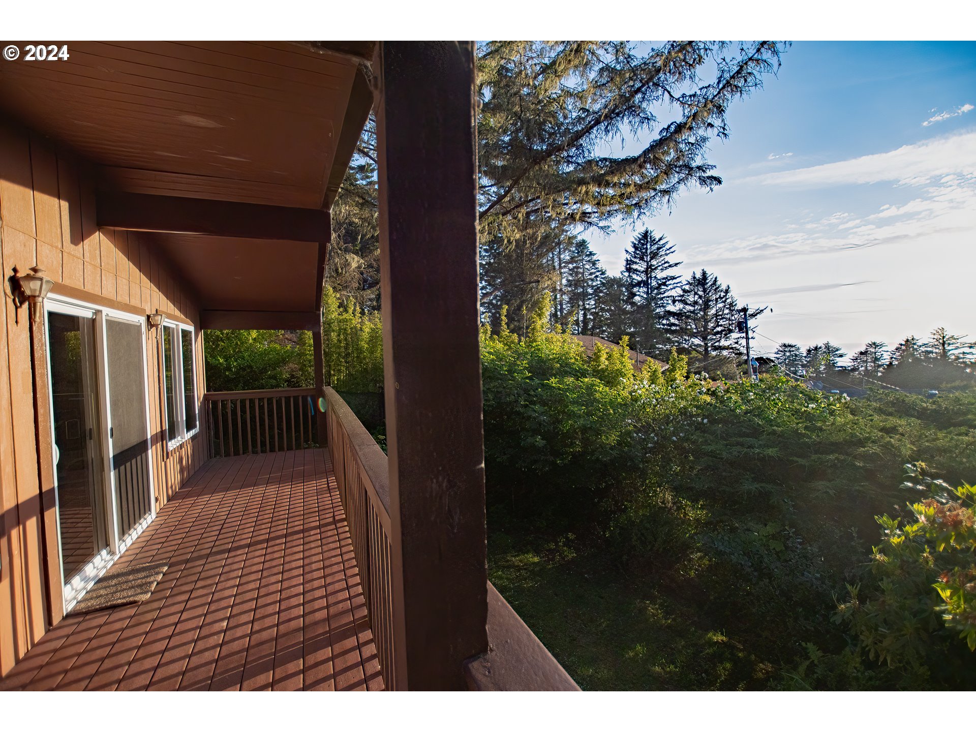 29280 Lacy Street Gold Beach, OR 97444 - Photo 2 of 38 a view of a backyard
