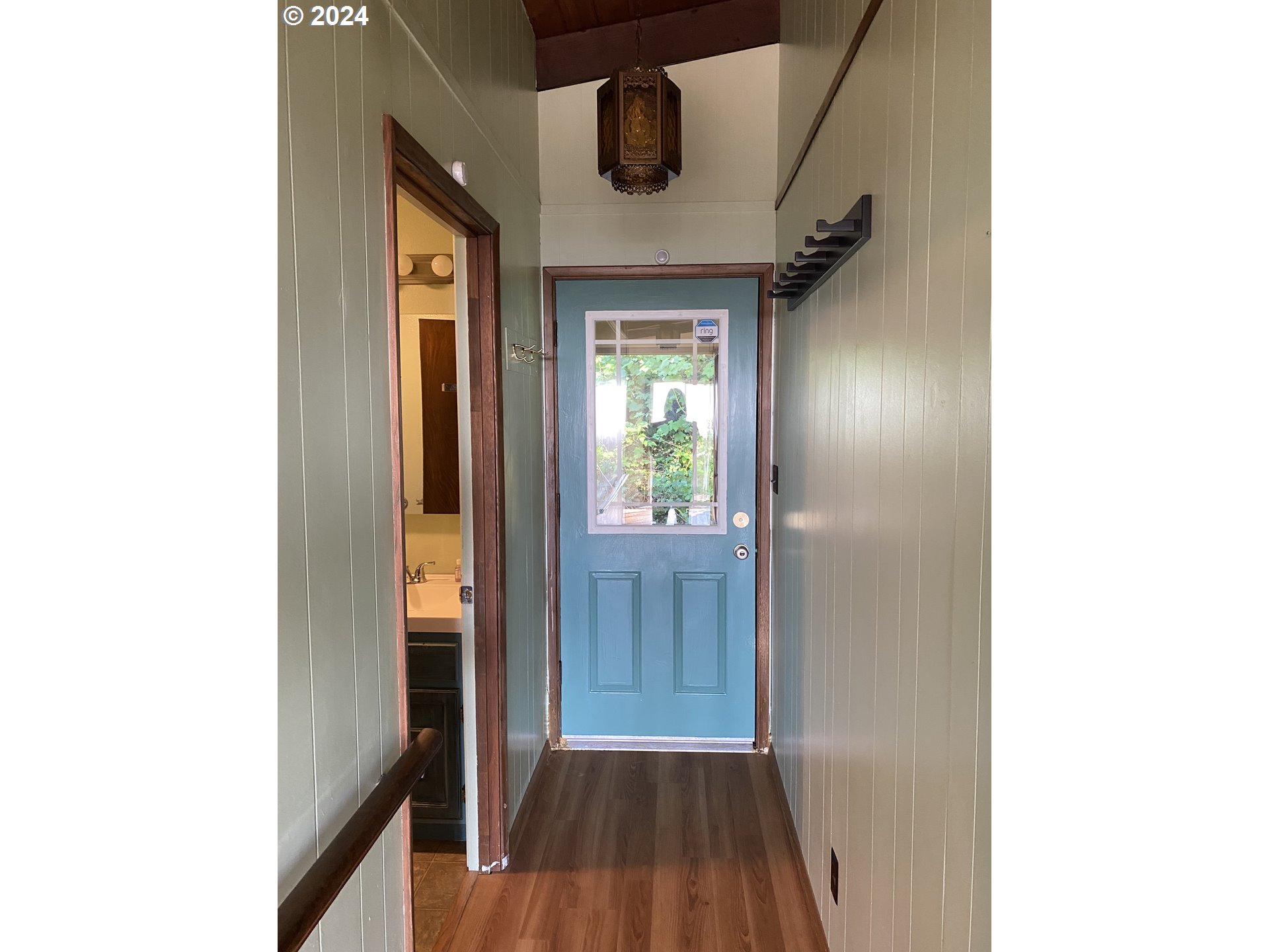 29280 Lacy Street Gold Beach, OR 97444 - Photo 25 of 38 a view of a hallway with wooden floor