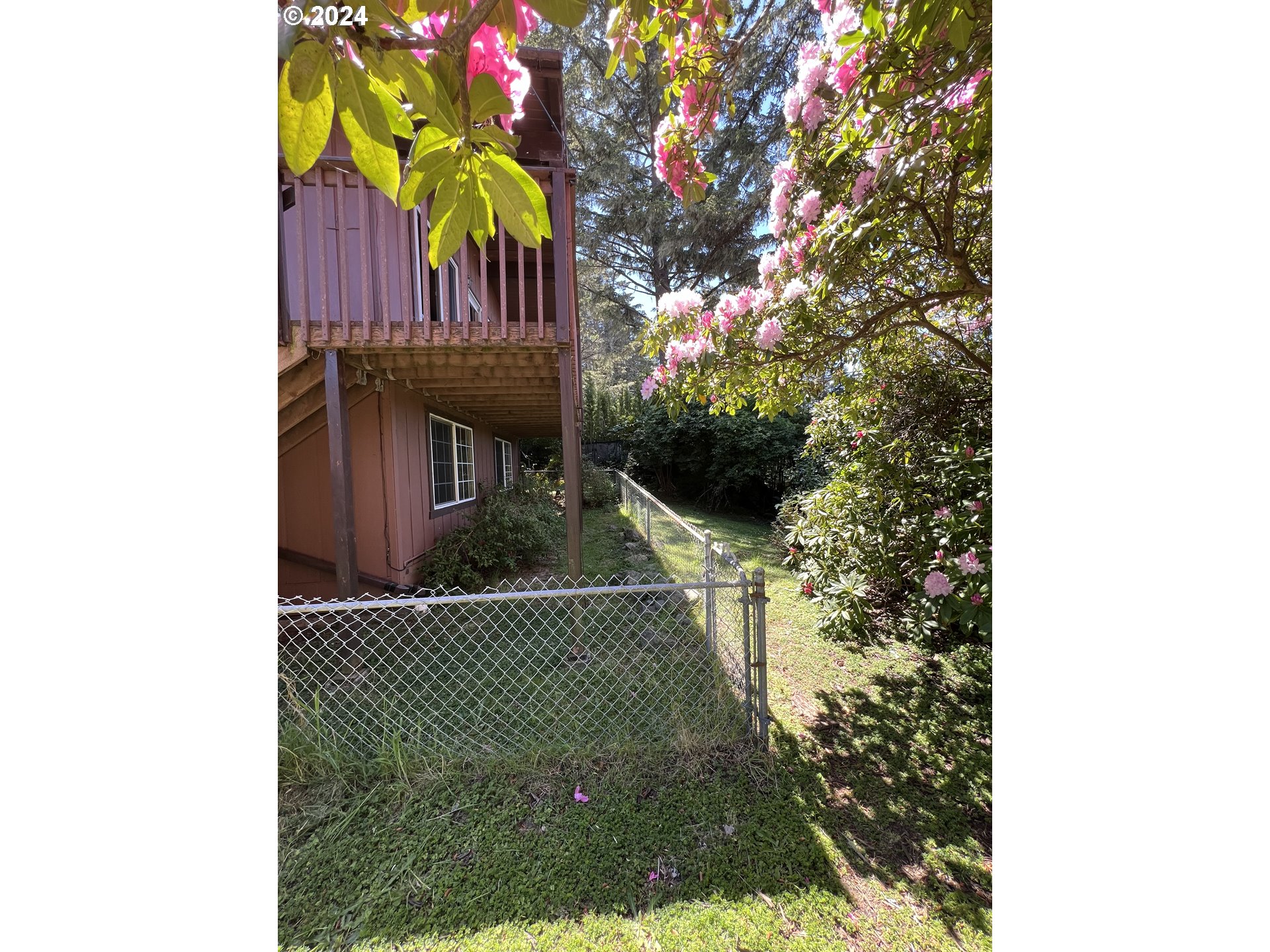 29280 Lacy Street Gold Beach, OR 97444 - Photo 36 of 38 a view of a house with a tree
