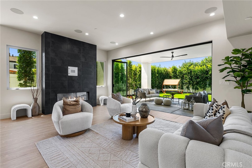 161 Cecil Place, Unit A Costa Mesa, CA 92627 - Photo 21 of 63 a living room with furniture and a large window