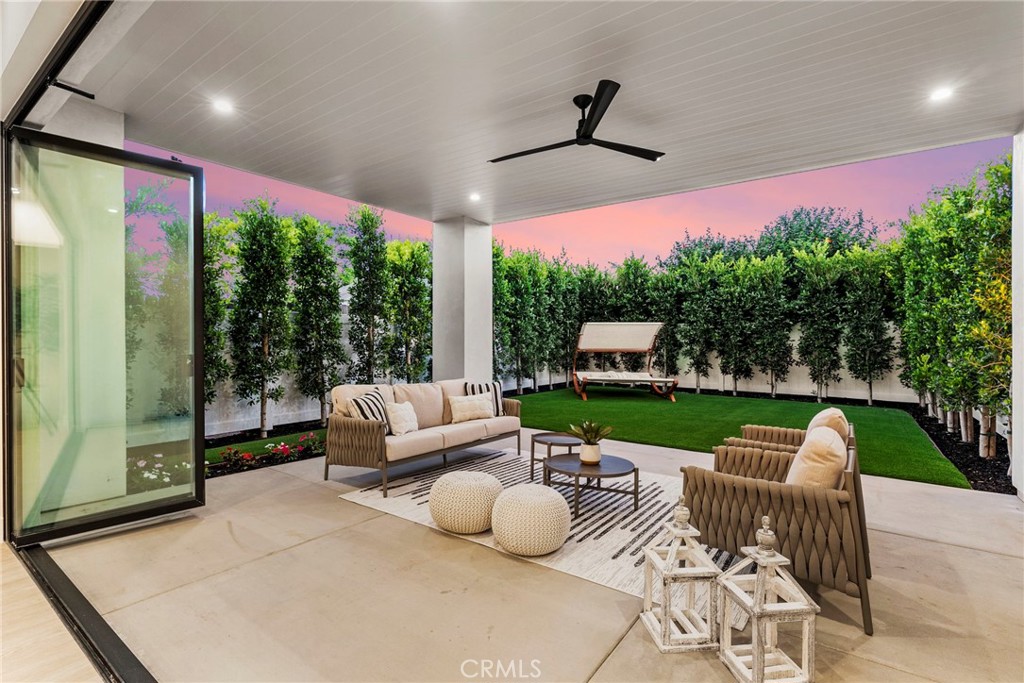 161 Cecil Place, Unit A Costa Mesa, CA 92627 - Photo 4 of 63 a outdoor living space with furniture and garden view