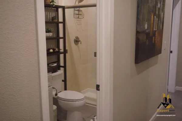a utility room with cabinets