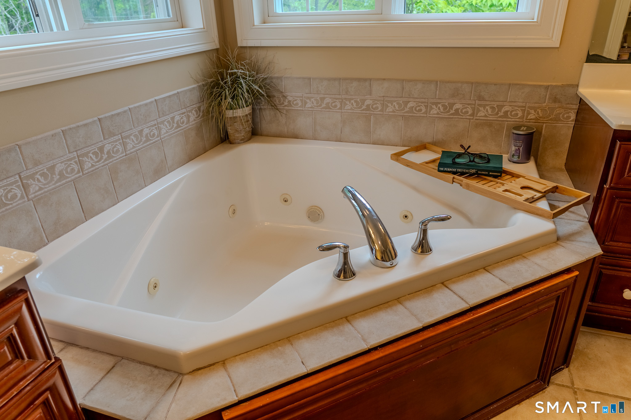 4 Ortense Road Wallingford, CT 06492 - Photo 22 of 33 a bath tub sitting in a bathroom next to a sink
