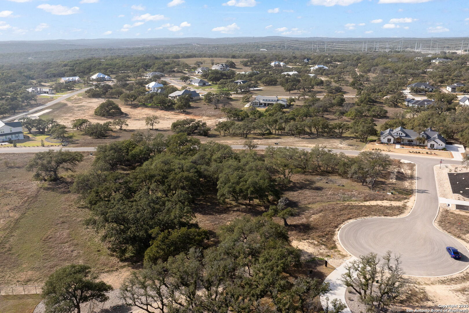 775 Green Gate View Bulverde, TX 78163 - Photo 22 of 48 an aerial view of residential building and parking space