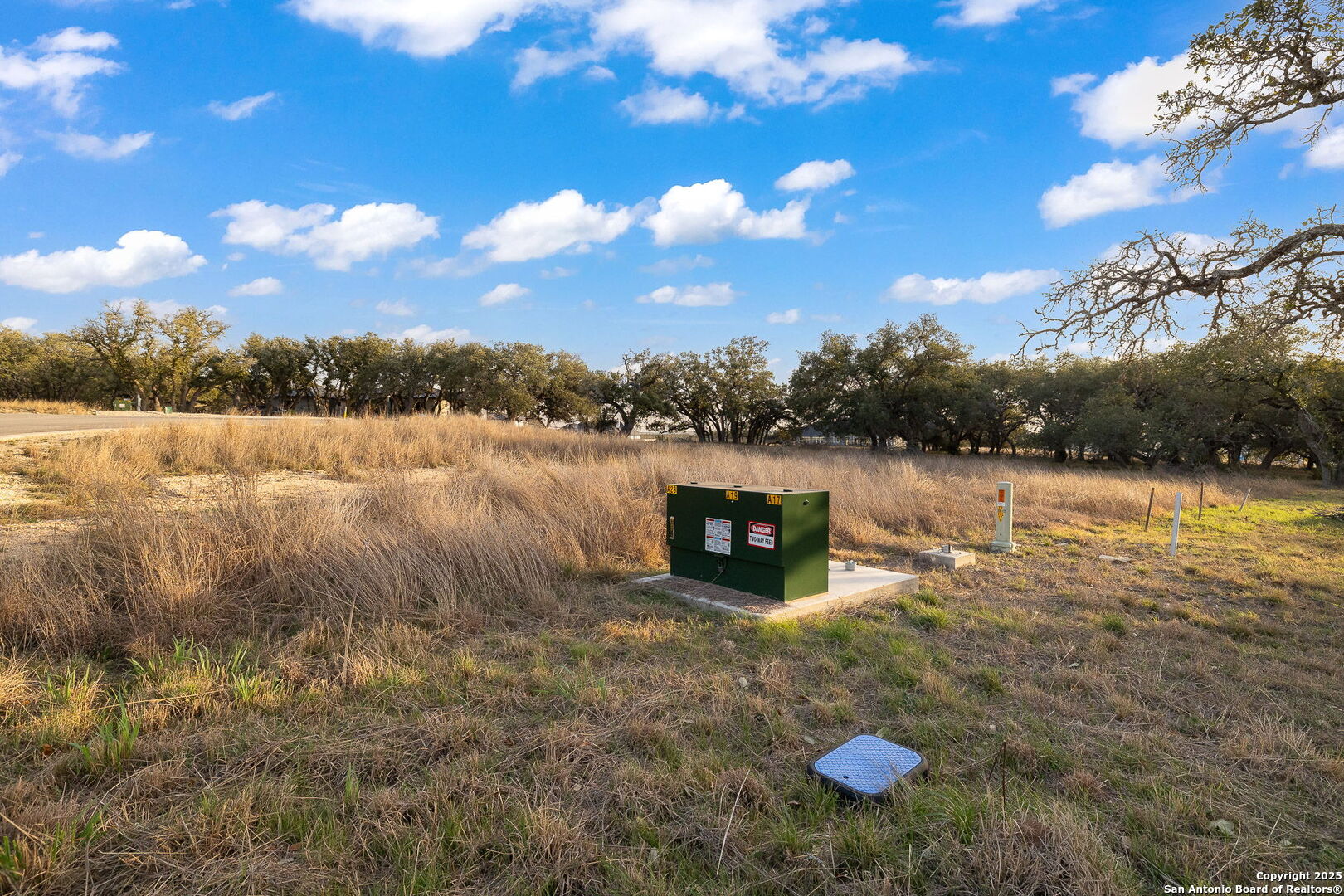 775 Green Gate View Bulverde, TX 78163 - Photo 33 of 48 a view of a lake with houses in the back