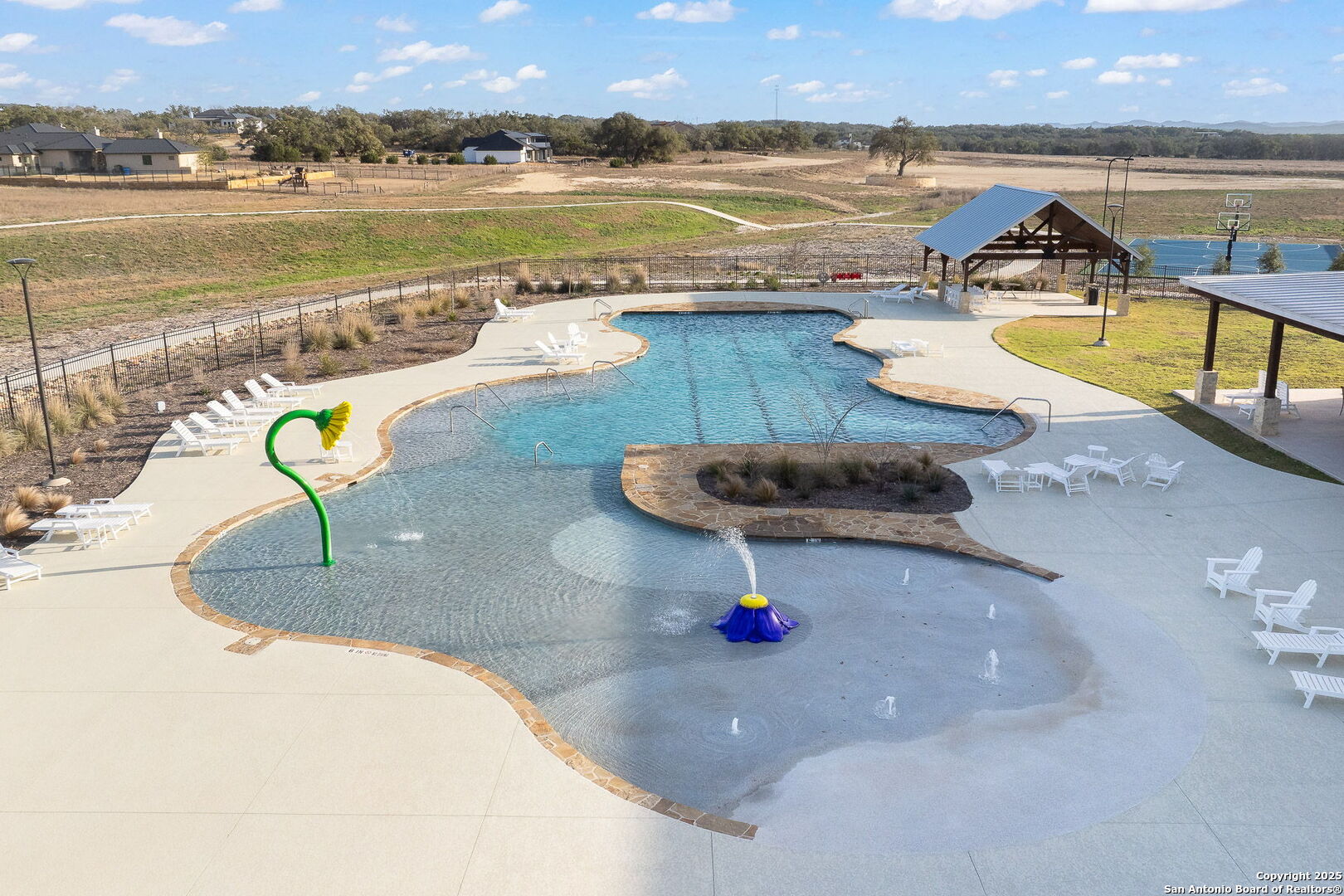 775 Green Gate View Bulverde, TX 78163 - Photo 39 of 48 swimming pool view with a lake view and a floor to ceiling window