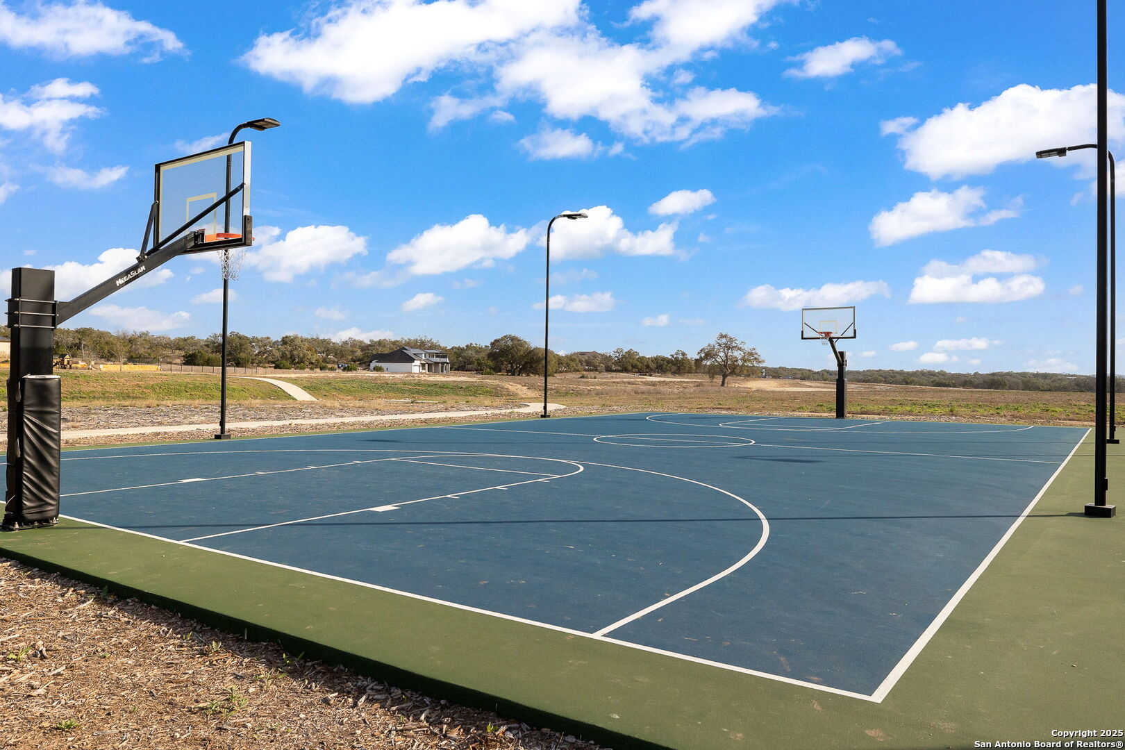 775 Green Gate View Bulverde, TX 78163 - Photo 41 of 48 a view of a tennis court with umbrellas in the background