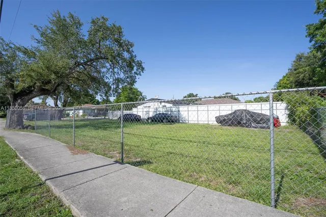 a view of a garden and basketball court