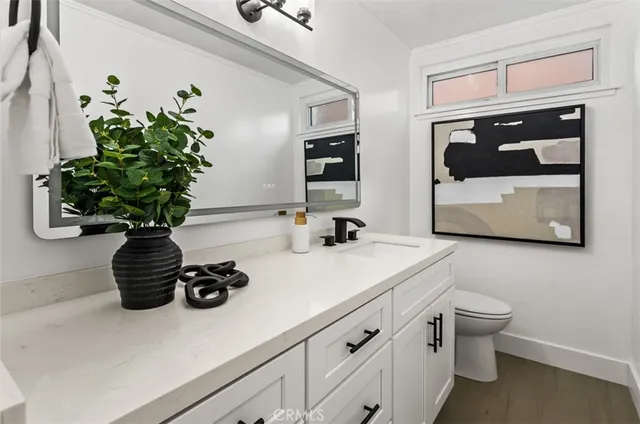 a view of a patio with a table chairs and a backyard