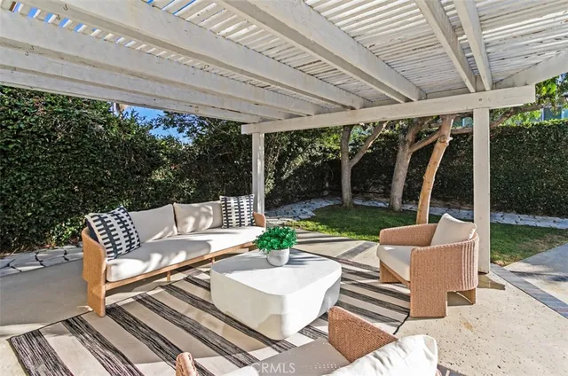 a view of house with outdoor seating space