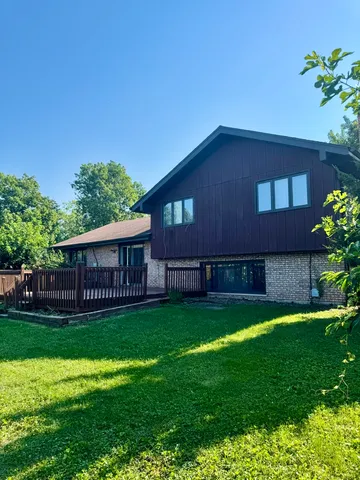 a view of a house with a deck