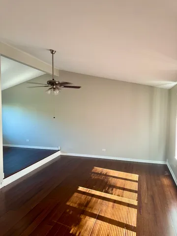 a view of room with a fan