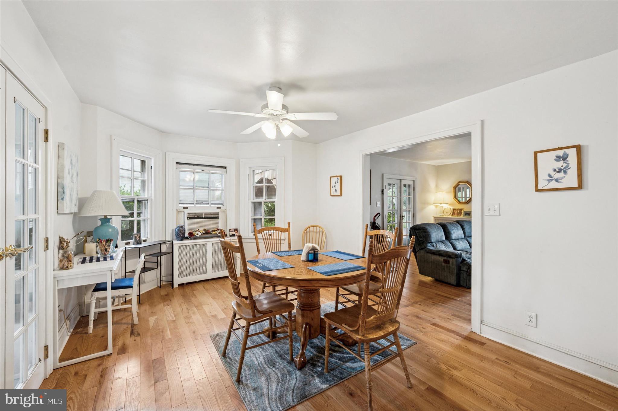 15 Oakland Road Broomall, PA 19008 - Photo 11 of 27 a view of a dining room with furniture and wooden floor