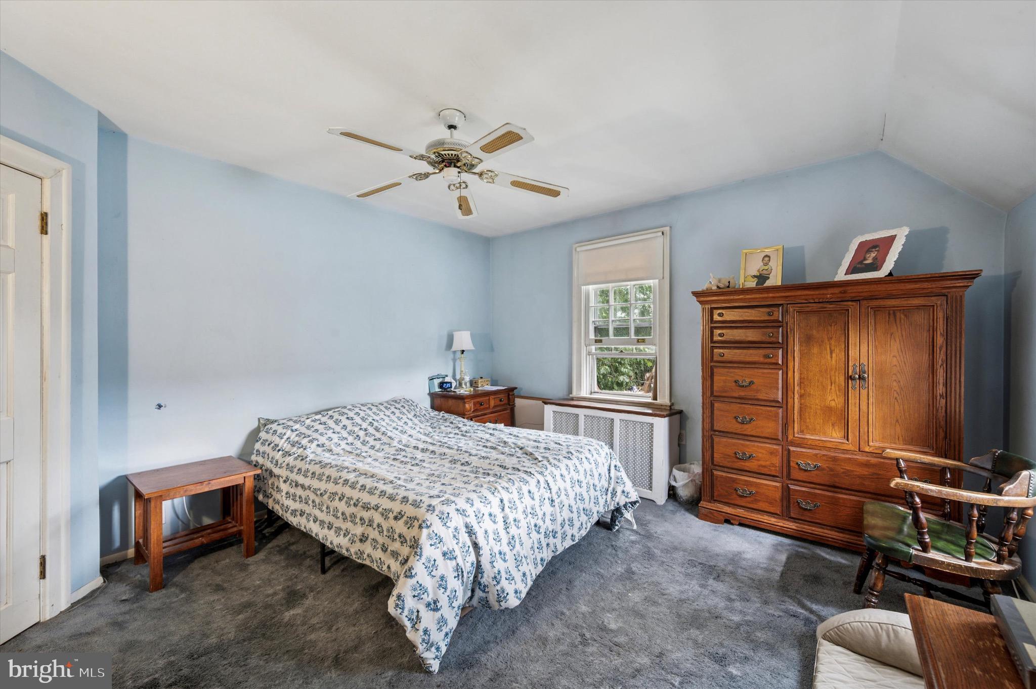 15 Oakland Road Broomall, PA 19008 - Photo 17 of 27 a bedroom with a bed and a tv on the dresser