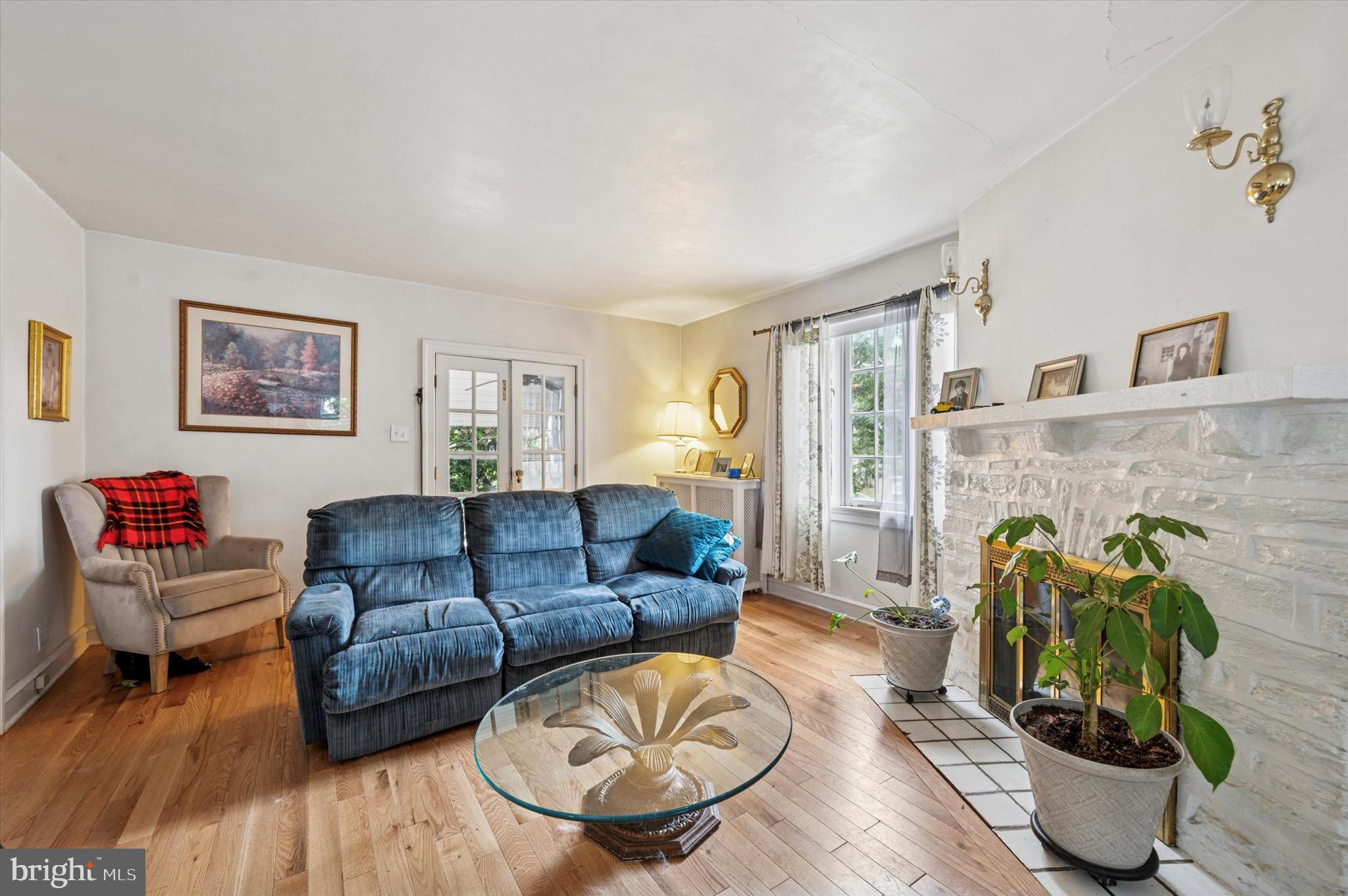 15 Oakland Road Broomall, PA 19008 - Photo 7 of 27 a living room with furniture and wooden floor