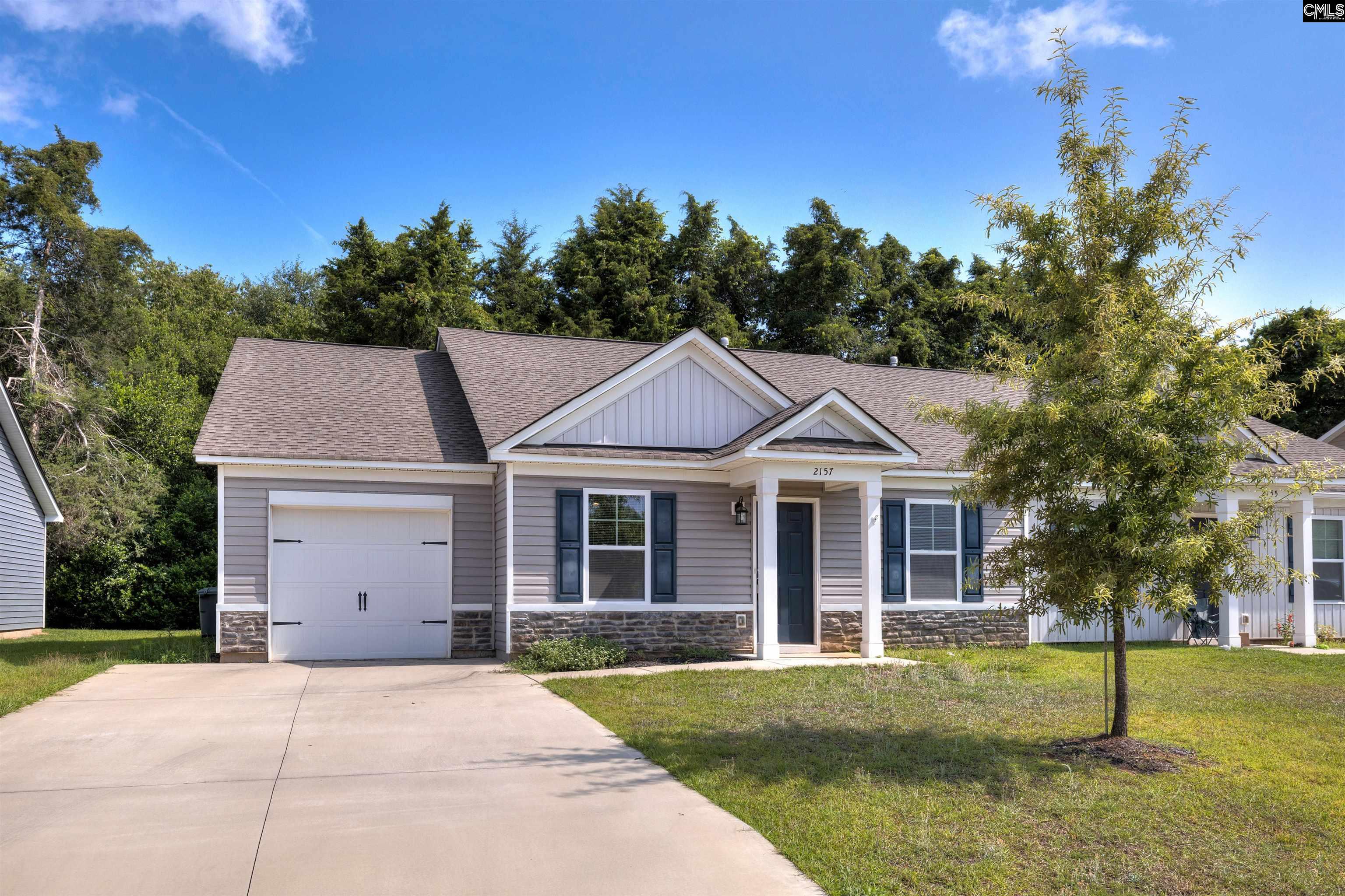 2157 Still Pointe Drive Sumter, SC 29154 - Photo 1 of 25 front view of a house with a yard