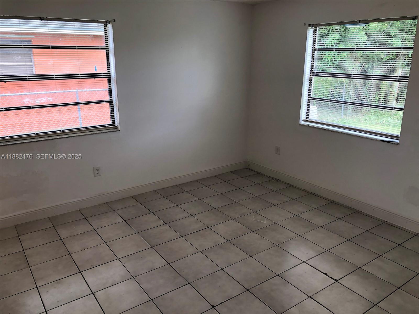 10250 Southwest 172nd Street Miami, FL 33157 - Photo 14 of 39 a view of a small space and window in a room