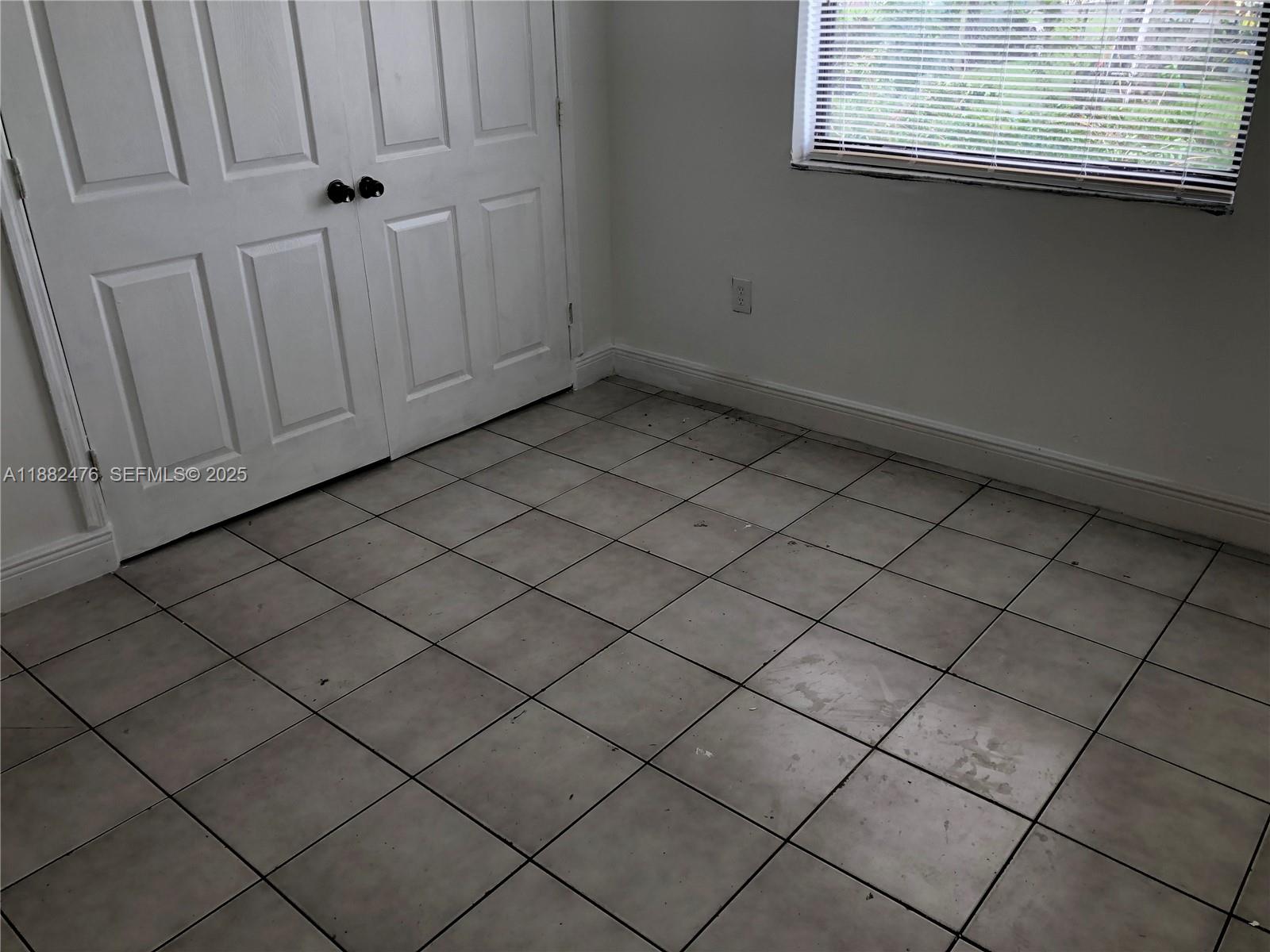 10250 Southwest 172nd Street Miami, FL 33157 - Photo 17 of 39 a view of a garage