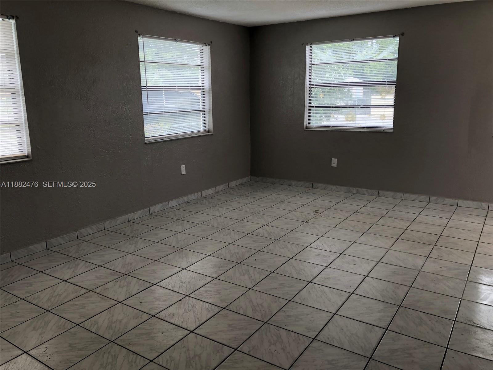 10250 Southwest 172nd Street Miami, FL 33157 - Photo 33 of 39 an empty room with windows