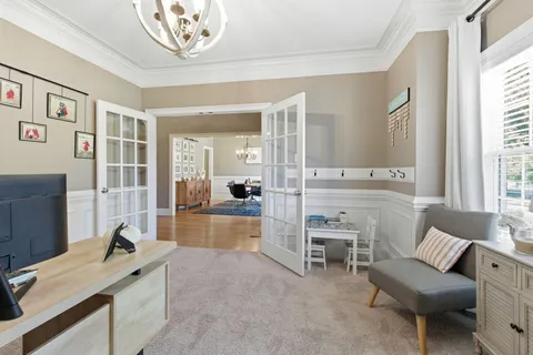 a bedroom with a bed and a couch