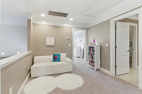 a view of a chairs and table in the patio