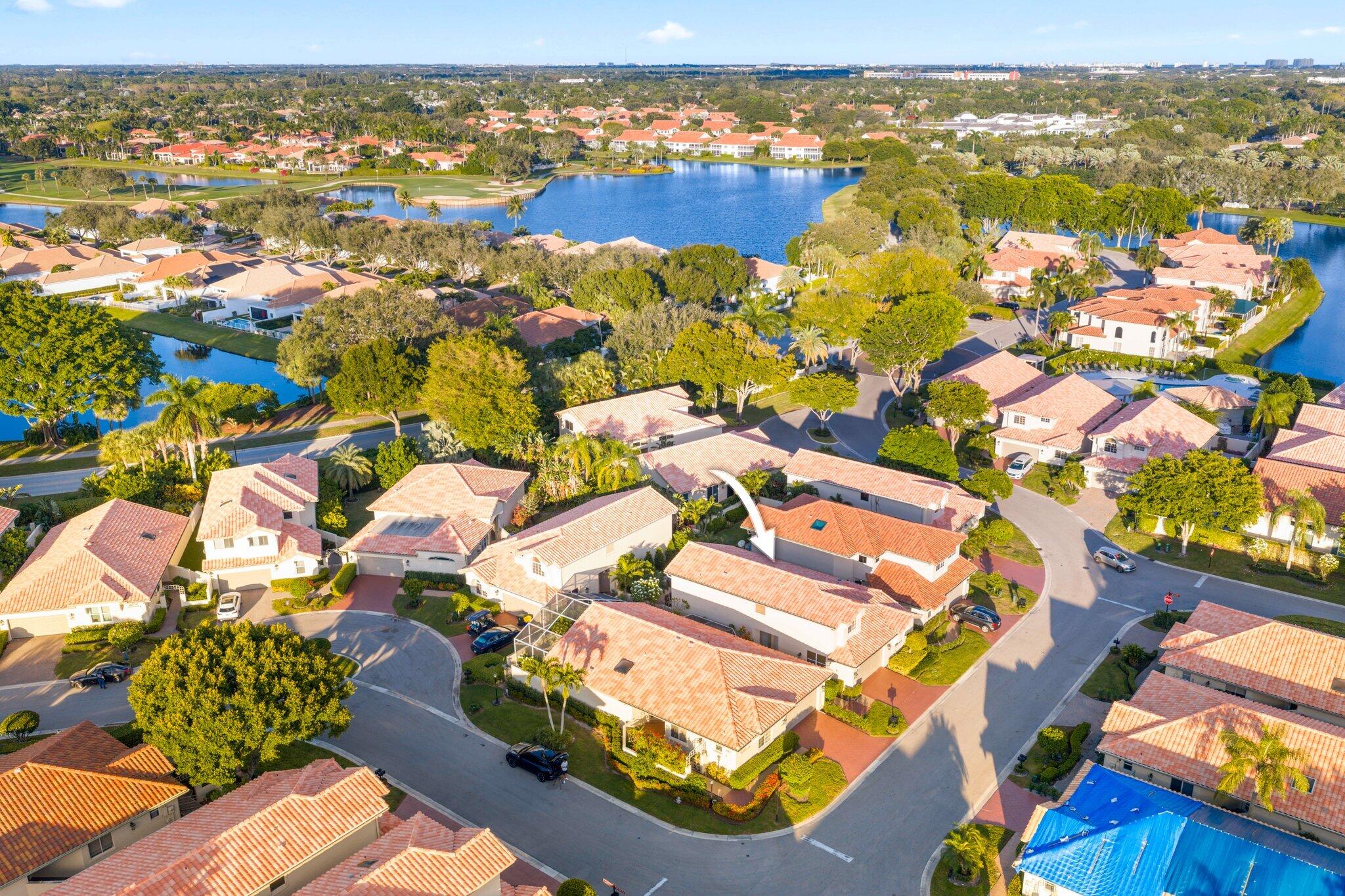2595 Northwest 53rd Street Boca Raton, FL 33496 - Photo 26 of 48 an aerial view of residential houses with outdoor space