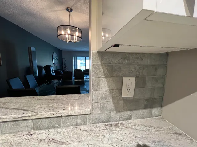 a view of a lobby with a chandelier