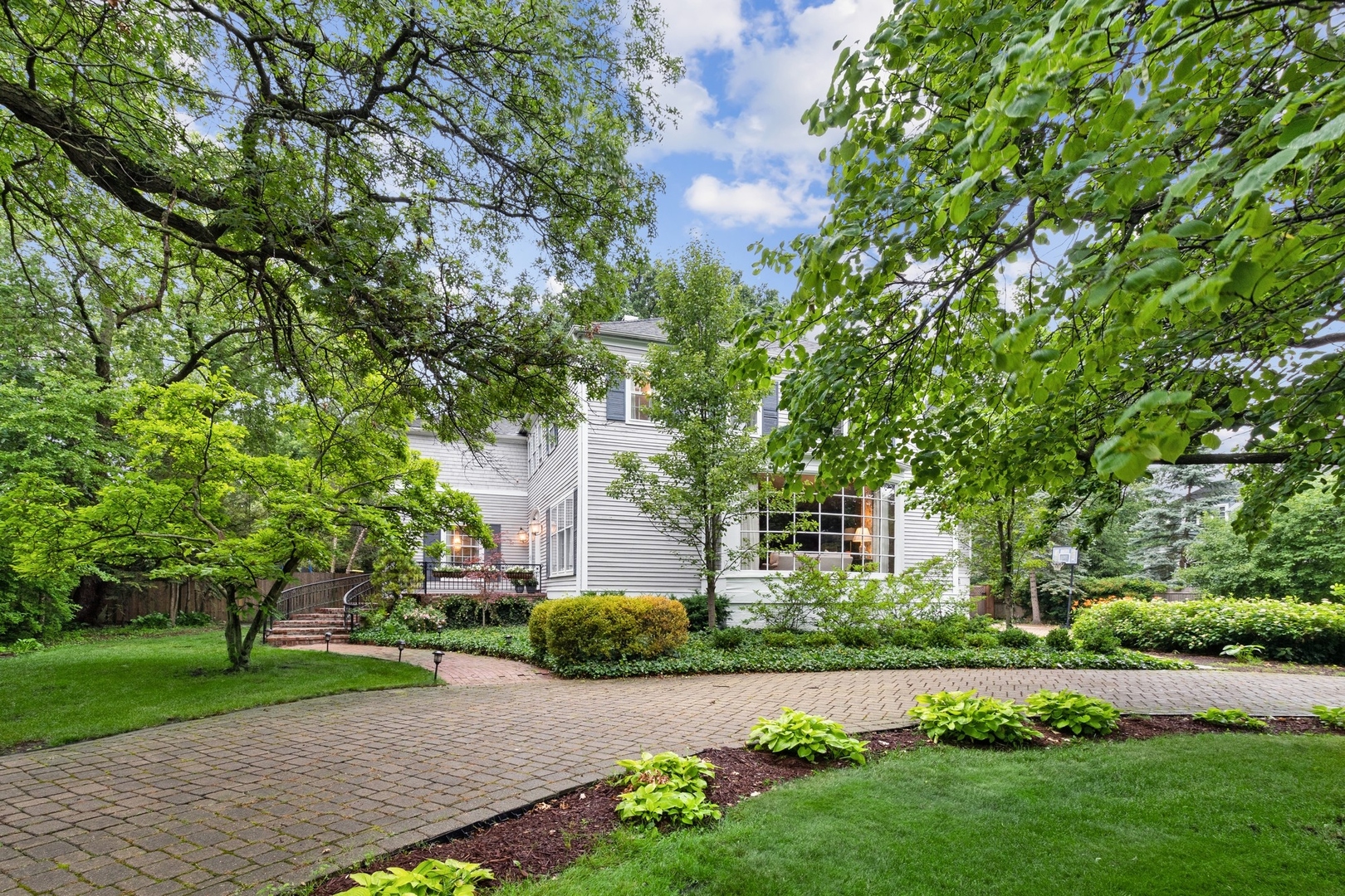 front view of a house with a yard