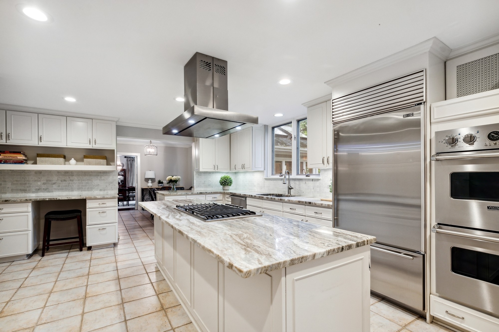 382 Ridge Avenue Winnetka, IL 60093 - Photo 26 of 43 a kitchen with a stove cabinets and stainless steel appliances