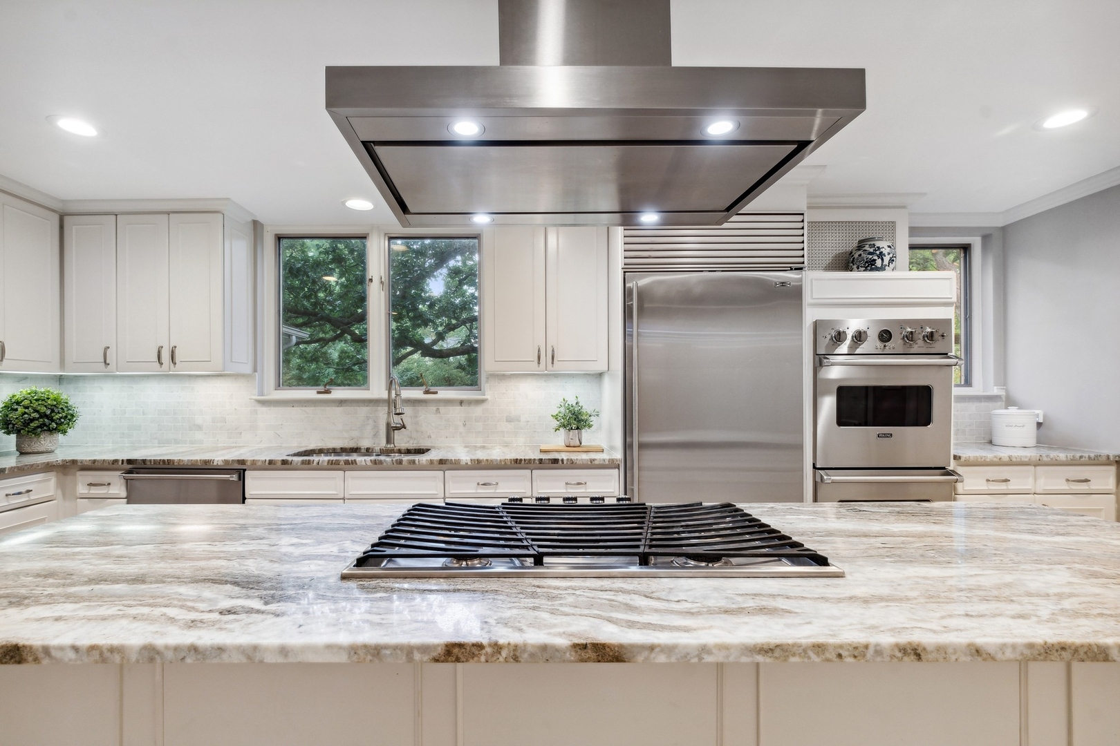382 Ridge Avenue Winnetka, IL 60093 - Photo 28 of 43 a kitchen with stainless steel appliances granite countertop a sink stove and refrigerator
