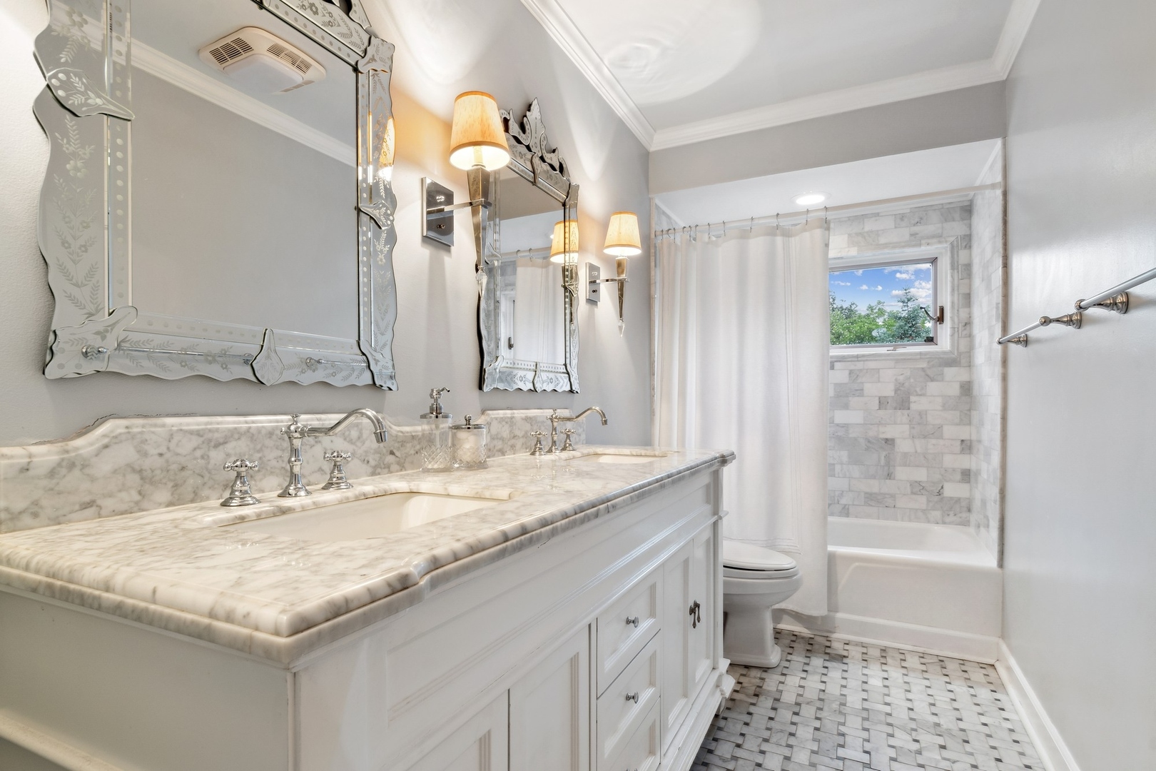 382 Ridge Avenue Winnetka, IL 60093 - Photo 30 of 43 a bathroom with a granite countertop sink a toilet a mirror and shower