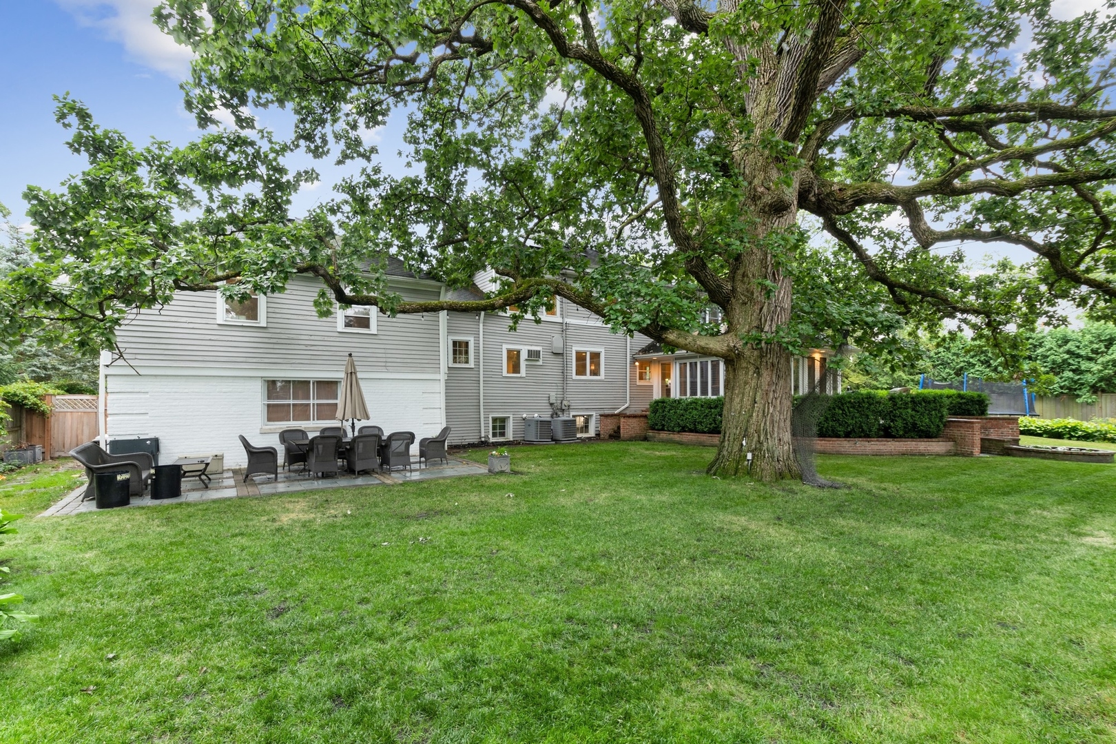 382 Ridge Avenue Winnetka, IL 60093 - Photo 43 of 43 a house view with a sitting space and garden