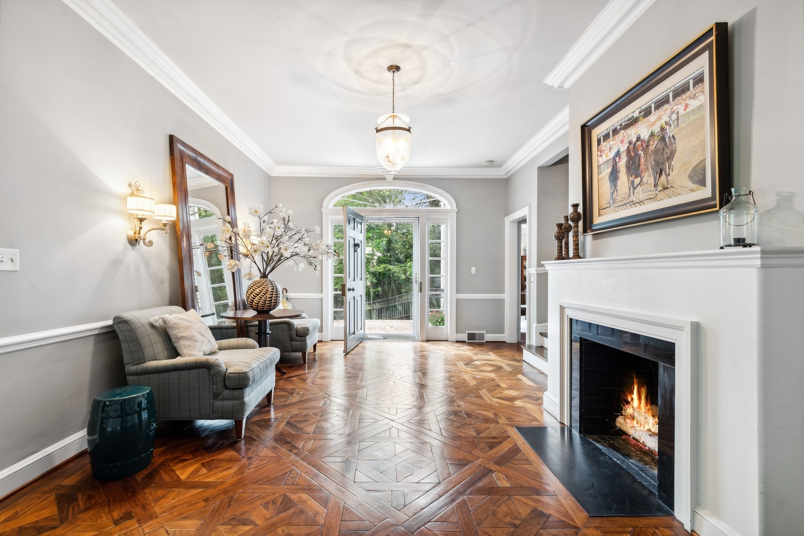 382 Ridge Avenue Winnetka, IL 60093 - Photo 6 of 43 a living room with furniture large window and a fireplace