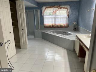 1 Wright Place Princeton Junction, NJ 08550 - Photo 11 of 13 a view of a kitchen with a sink dishwasher and a fireplace