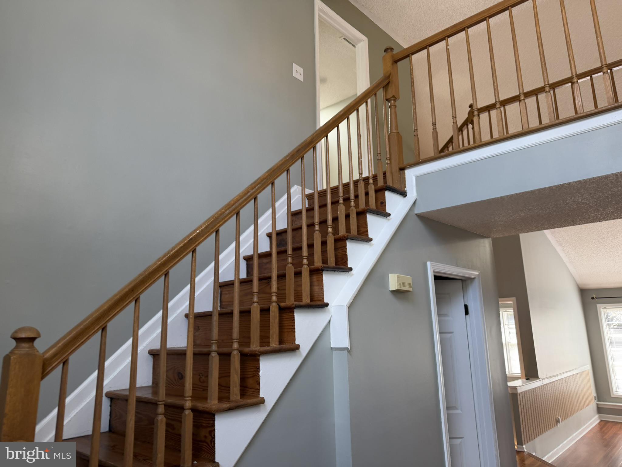 1 Wright Place Princeton Junction, NJ 08550 - Photo 16 of 27 Inviting staircase with warm wood tones.