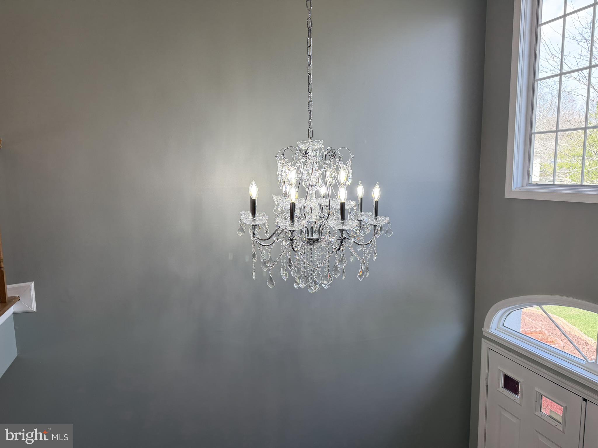 1 Wright Place Princeton Junction, NJ 08550 - Photo 18 of 27 Elegant chandelier illuminates entryway.