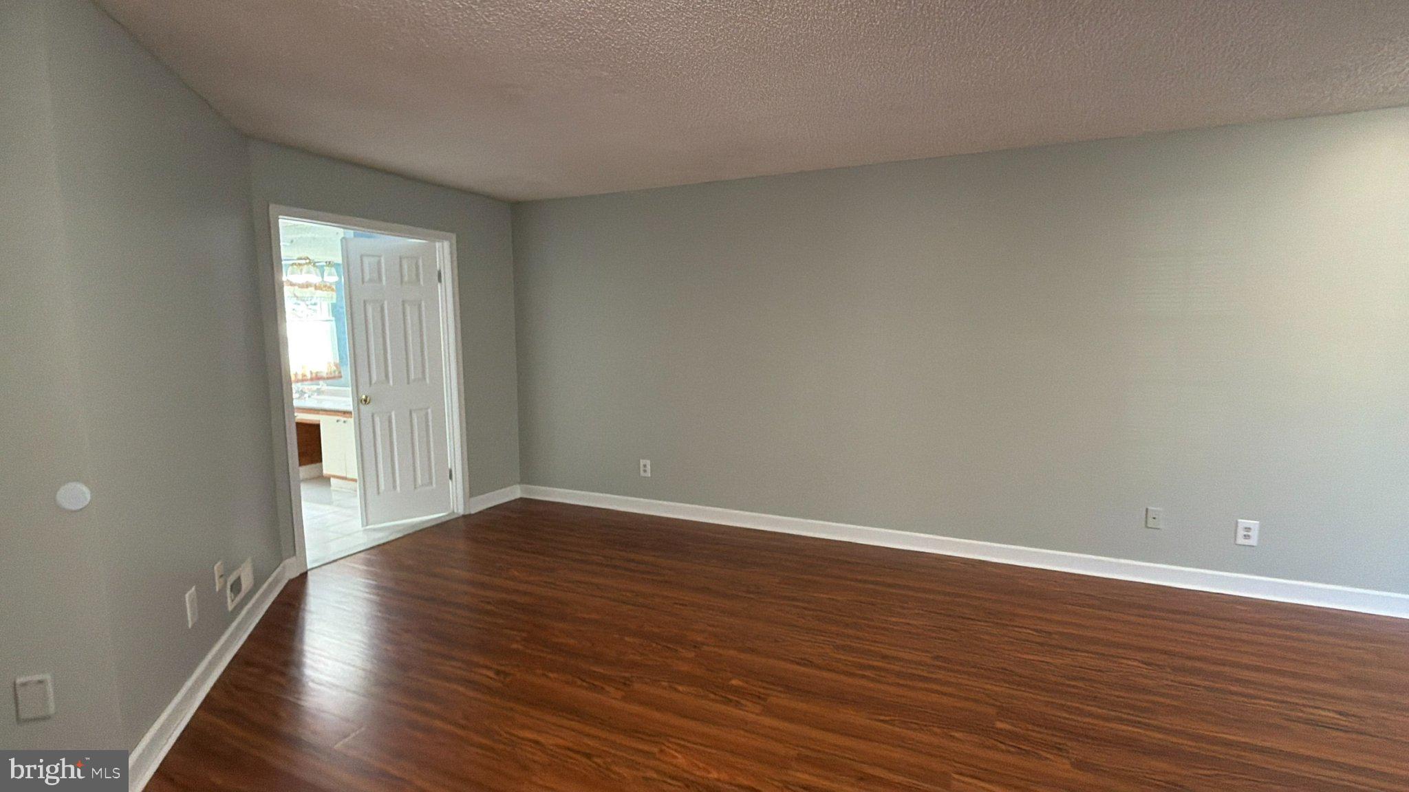 1 Wright Place Princeton Junction, NJ 08550 - Photo 23 of 27 Spacious room with warm wood floors.