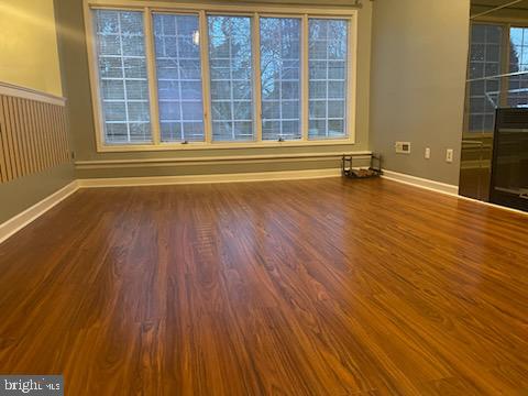 1 Wright Place Princeton Junction, NJ 08550 - Photo 7 of 13 a view of a room with wooden floor and windows