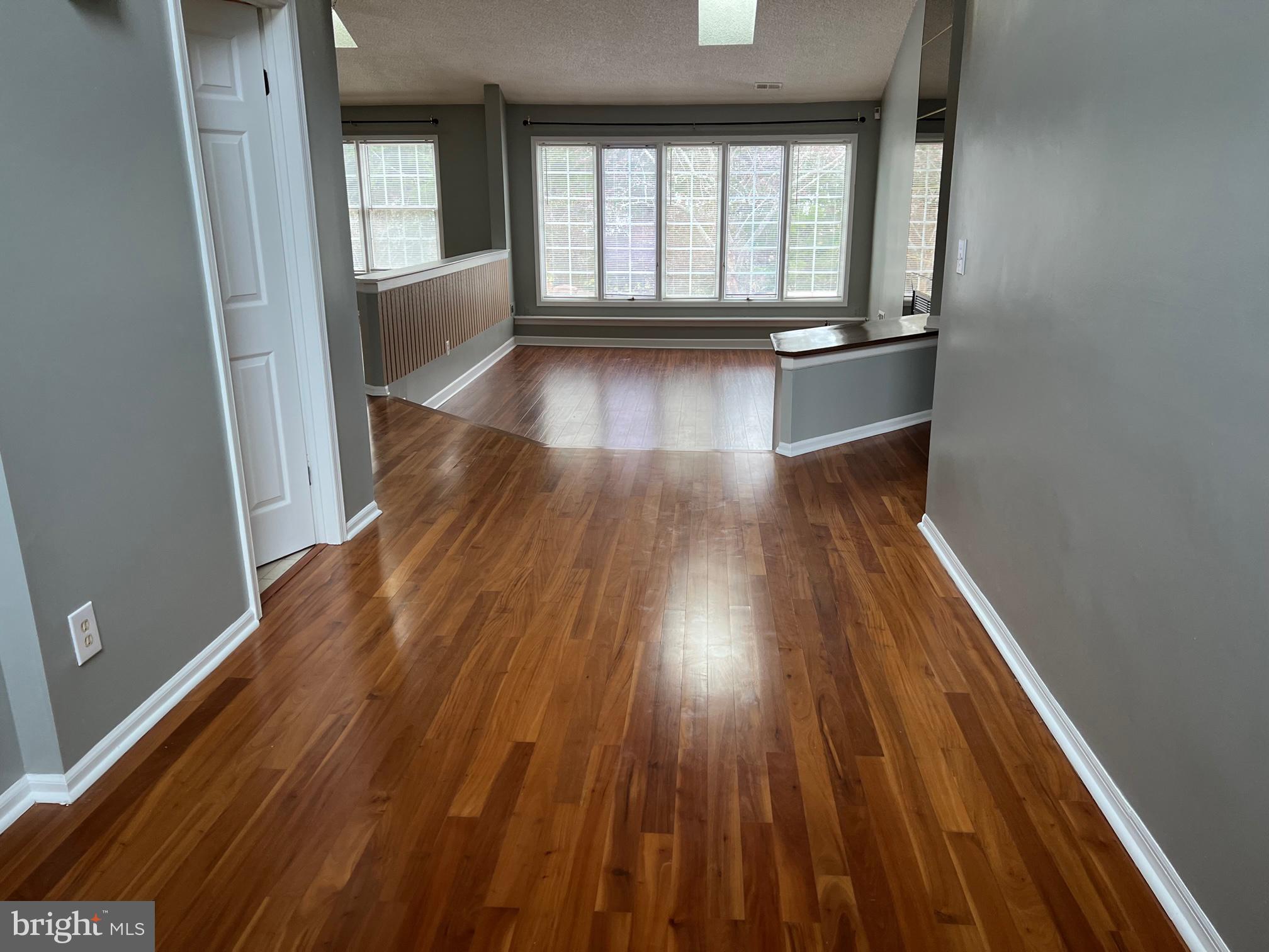1 Wright Place Princeton Junction, NJ 08550 - Photo 10 of 13 wooden floor in an empty room with a window