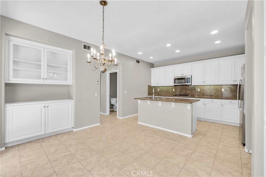 14 Conservatory Drive Ladera Ranch, CA 92694 - Photo 9 of 27 Great storage in the kitchen!